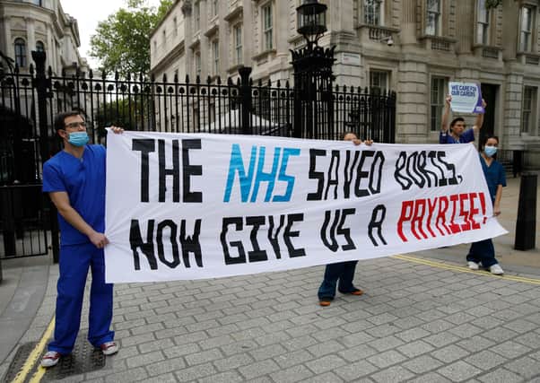 Nurses outside the gates of 10 Downing Street - do they deserve a pay rise?
