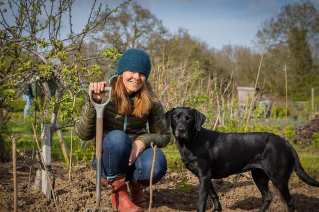 Polly and her dog at the allotment