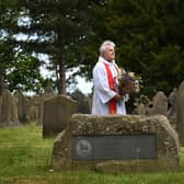 Rev Craig Marshall pictured at Weeton's St Barnabas church, where there is a memorial stone. Picture Jonathan Gawthorpe