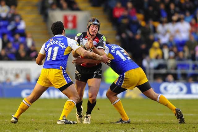 Steve Menzies looks for a gap in the Wolves defence