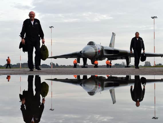 Members of the crew of Vulcan XH558, a restored nuclear bomber, walk from the aircraft after its final flight at Doncaster Sheffield Airport in October 2015.
 Picture: Owen Humphreys/PA Wire