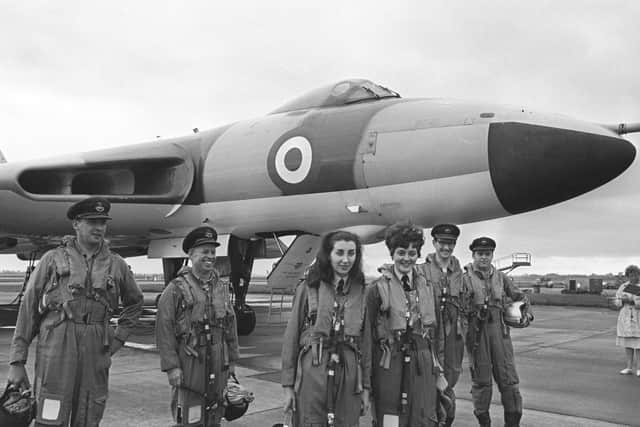 WRAF girls Margaret Drabble (left) and Rita Smith, the first women to fly in one of the Vulcan Bombers, with members of the crew, in June 1966. Picture PA Wire