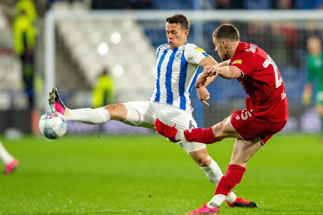 Jonathan Hogg tries to block Tommy Rowe's pass.
Huddersfield Town v Bristol City.  SkyBet Championship.  John Smiths Stadium.
25 February 2020.
Picture Bruce Rollinson