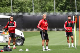 HELLO AGAIN: Sheffield United's Billy Sharp, Phil Jagielka and George Baldock return to training at the club's Steelphalt Academy. Picture: Simon Bellis/Sportimage