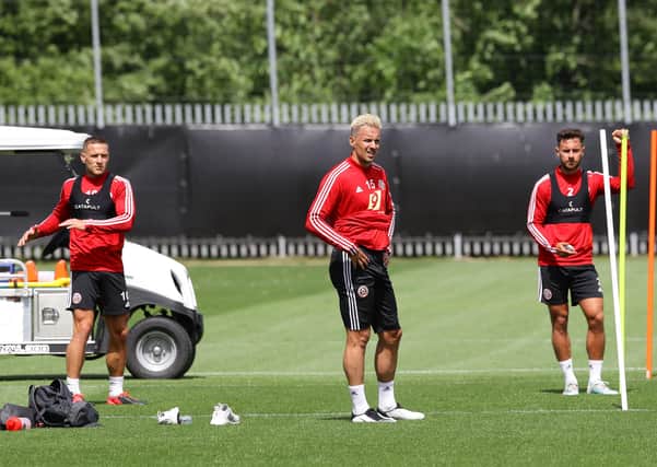 HELLO AGAIN: Sheffield United's Billy Sharp, Phil Jagielka and George Baldock return to training at the club's Steelphalt Academy. Picture: Simon Bellis/Sportimage