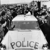 2nd November 1959:  Minister of Transport, Ernest Marples uses a police radio telephone to order County Police to open up the newly inaugurated M1 motorway to traffic. The 72 mile section between London and Birmingham is Britain's first motorway.  (Photo by Harry Todd/Fox Photos/Getty Images)