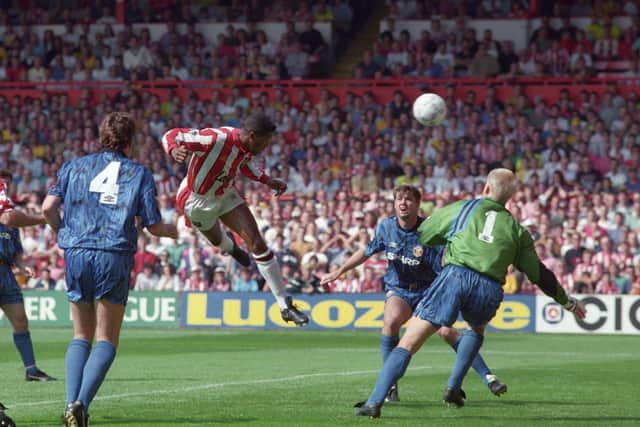 On target: Sheffield United striker Brian Deane scores the first goal in Premiership history, against Manchester United in August, 1992.