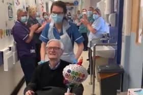 Don Gill, from Beeston, leaving hospital to a round of applause from NHS staff (Photo: Leeds Teaching Hospitals NHS Trust)