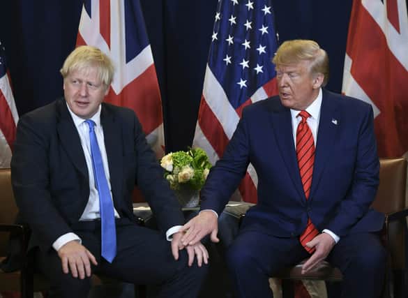 US President Donald Trump and British Prime Minister Boris Johnson hold a meeting at UN Headquarters in New York, September 24, 2019. Photo by SAUL LOEB / AFP via Getty Images.