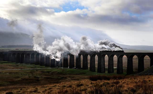 The Winter Cumbrian Mountain Express steams over the Ribblehead Viaduct on the Settle Carlisle line. Picture Bruce Rollinson