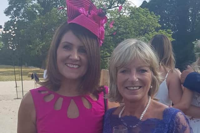Wearing a pink dupion silk dress by Jilllan Welch design in Harrogate, Sharon Cameron earlier this year with Carol Flather in blue chantilly lace. Both silks from James Hare Leeds.