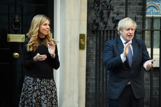 Boris Johnson and his fiancee Carrie Symonds showed their support for the NHS earlier this month.