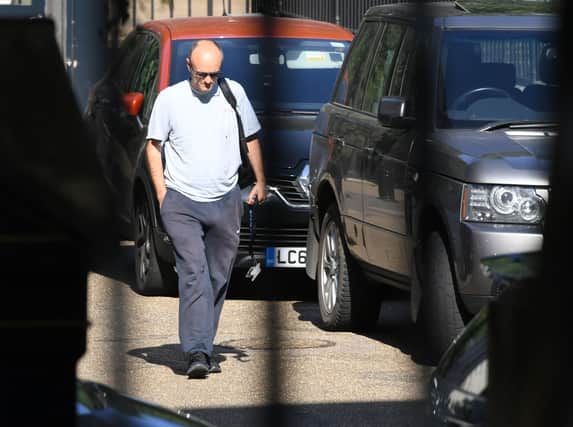 Boris Johnson's top aide Dominic Cummings arrives in Downing Street, as the row over his trip to Durham during lockdown continues.