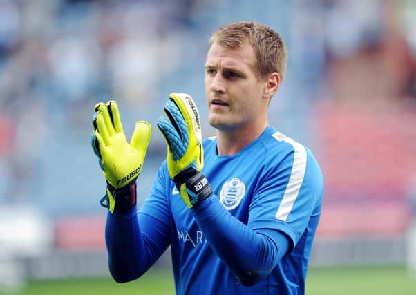 Alex Smithies: Applauds the Huddersfield crowd after returning with QPR in 2016 (Picture: Jonathan Gawthorpe)