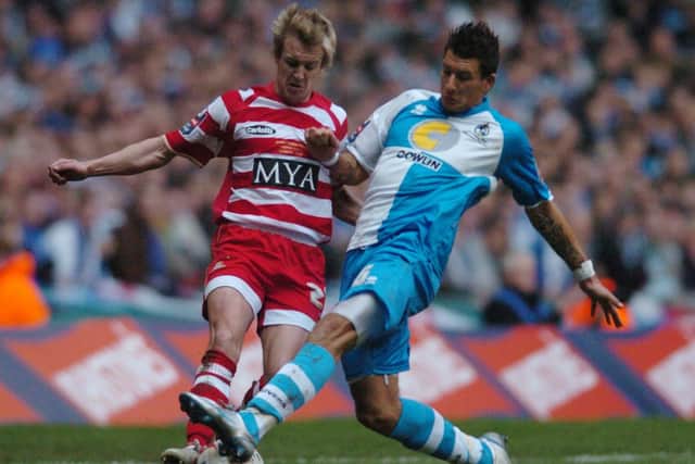Back in the day -  James Coppinger challenges for the ball with Bristol Rovers' Steve Elliott in the Johnstone Paint's Troph final in Cardiff in 2007. (Picture: Gerard Binks)