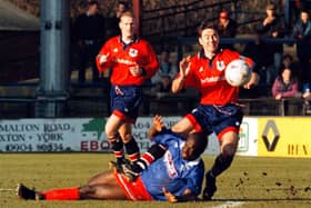 15:02:97: York City -v- Gillingham.York Cities Andy McMillan gets into a tangle with the Gillingham opposition.