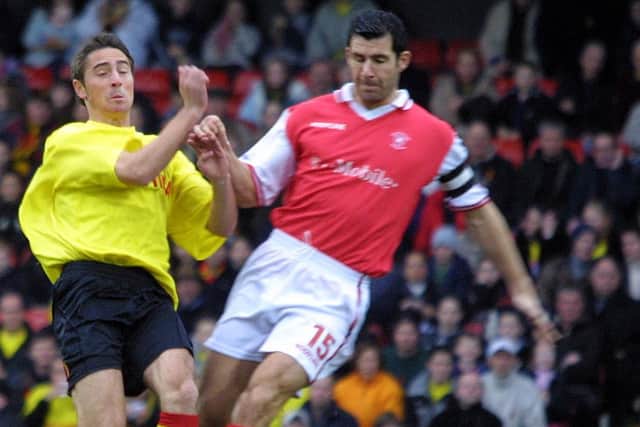 Watford's Tommy Smith left is challenged by Rotherham's Martin McIntosh during a clash back in February 2003. Picture: Mark Lees/PA.