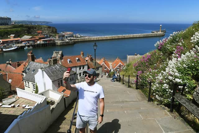 A man takes a selfie on the famous Whitby Abbery steps. Picture Jonathan Gawthorpe 30th May 2020.