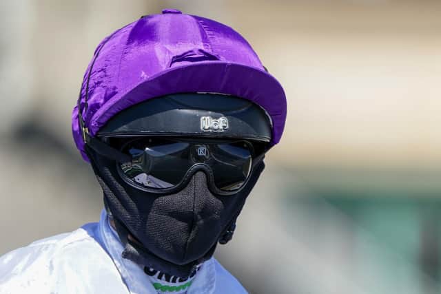 Jockey Luke Morris in his face covering at Newcastle Racecourse. Issue date: Monday June 1, 2020. PA Photo. Horse Racing in the UK returned to action on Monday following the coronavirus shutdown. See PA story RACING Resumption. Photo credit should read: Alan Crowhurst/PA Wire