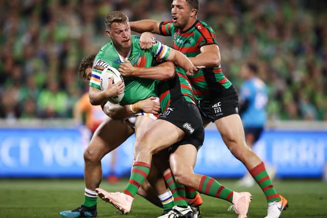 MAKING HIS MARK: Canberra Raiders' Elliott Whitehead battles against South Sydney Rabbitohs' Sam Burgess at GIO Stadium in September last year. Picture: Brendon Thorne/Getty Images)