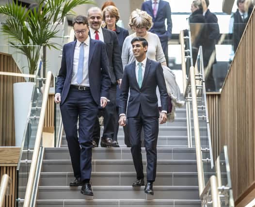Chancellor Rishi Sunak with Simon Clarke MP (left) in Leeds on March 12 to sign the West Yorkshire devolution deal. Picture: Danny Lawson/PA Wire
