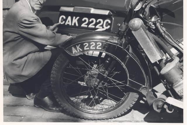 A Scott motorcycle once driven by Captain Tom Moore, restrored by photographer C.H. Wood