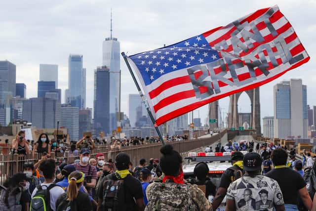 Protestetsr march on Brooklyn Bridge, New York, in honour of the Black Lives Matter movement.