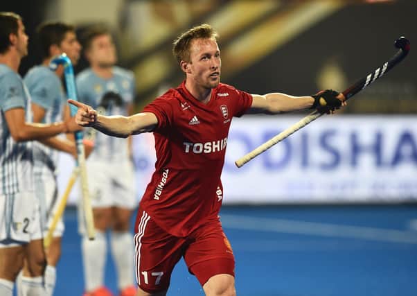 BHUBANESWAR, INDIA - DECEMBER 12:  Barry Middleton of England celebrates after scoring his team's first goal during the FIH Men's Hockey World Cup quarter final match between Argentina and England at Kalinga Stadium on December 12, 2018 in Bhubaneswar, India. (Photo by Charles McQuillan/Getty Images for FIH)