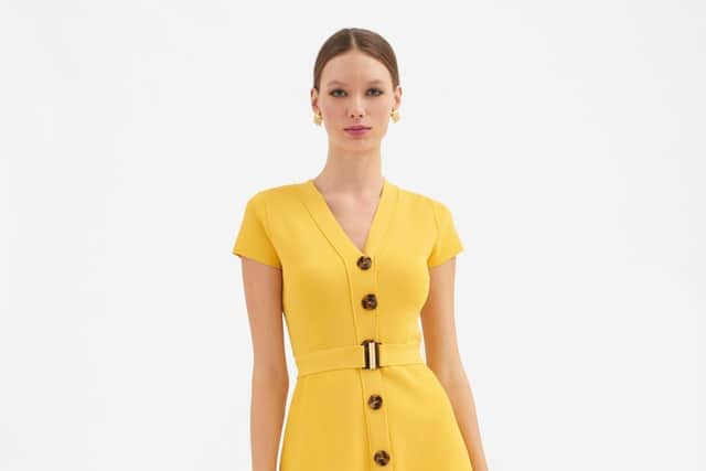 Yellow button-through dress, was £382.95, now £285, by Luisa Spagnoli at Helen Sykes Fashions, Stanningley Road in Leeds.