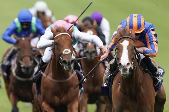Love and Ryan Moore (right) were impressive winners of the Qipco 1000 Guineas.