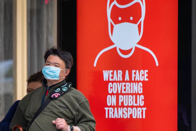 Face coverings will be mandatory on public transport from next week. Photo: Dominic Lipinski/PA Wire