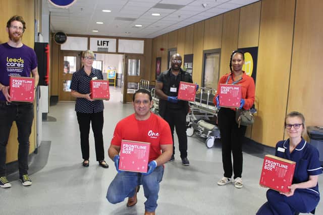 Ikram Butt, ambassador for  UK-based One Family',whichhas been leading volunteer teams to deliver frontline care boxes to NHS staff across the country.
Mr Butt (pictured centre) with members of Mr Johsnon's family and representatives  of Leeds Cares after deliveing care boxes to St James's Hospital.