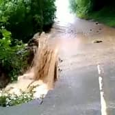 Flooding on the road between Grinton & Leyburn last summer. Pic by North Yorkshire Police/SWNS