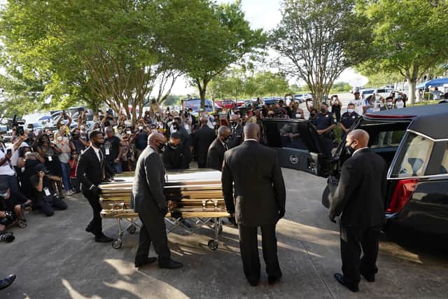 Mourners in America at the funeral of George Floyd.