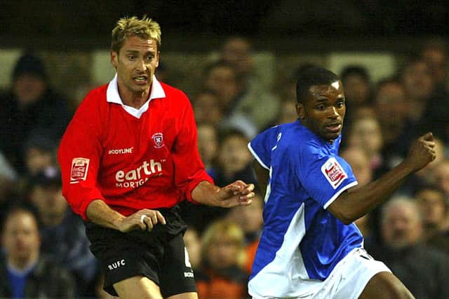 THAT WAS THEN: Rob Scott, pictured in action  during his playing days for Rotherham against Ipswich's Darren Bent. Picture: Scott Heavey/Getty Images.