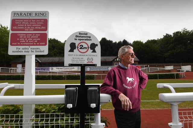 Pontefract managing director Norman Gundill with some of the racecourse's new signage. Photo: Simon Hulme.