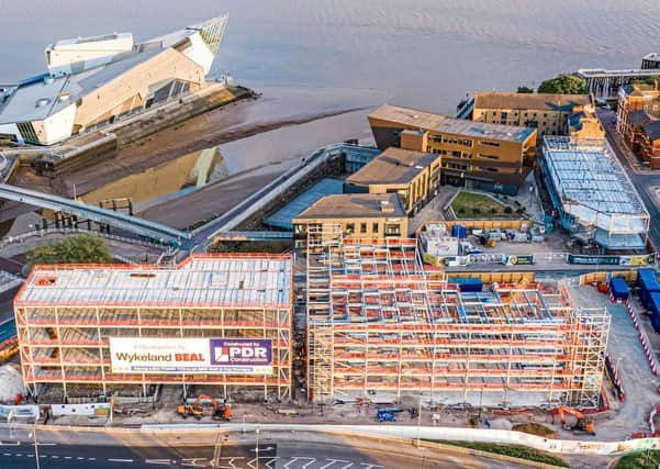 An aerial view of current Wykeland projects in Hull’s Fruit Market waterfront district – a flagship head office for Arco and 350-space multi-storey car park, in the foreground, and a sister building for the Centre for Digital Innovation (C4DI), top right.

Picture: Octovision Media
