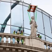 New statues being installed at The Majestic in Leeds.