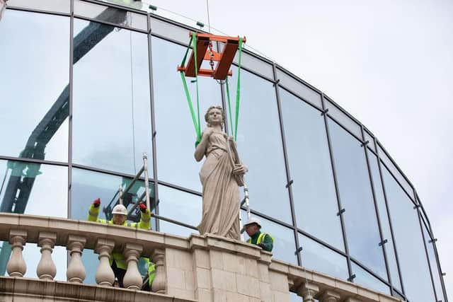 New statues being installed at The Majestic in Leeds.