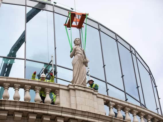 New statues being installed at The Majestic in Leeds.