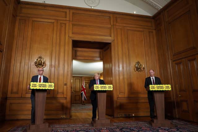 Handout photo issued by 10 Downing Street of (left to right) Chief Scientific Adviser Sir Patrick Vallance, Prime Minister Boris Johnson and Chief Medical Officer Professor Chris Whitty, during a media briefing in Downing Street, London, on coronavirus.