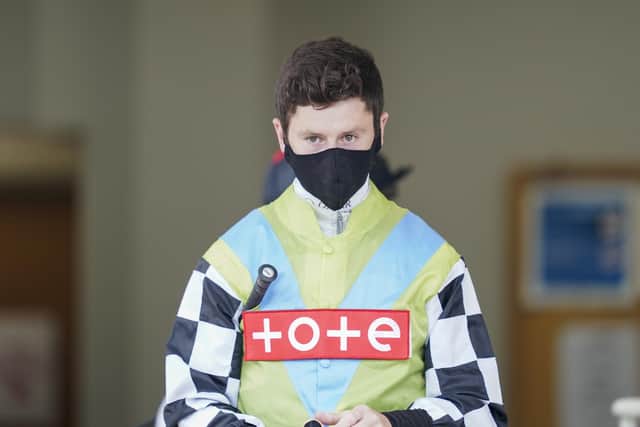 Champion jockey Oisin Murphy is still getting used to wearing face masks in races.  Photo: Alan Crowhurst.