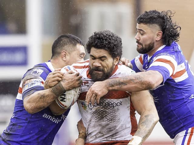 Picture by Allan McKenzie/SWpix.com - 10/03/2019 - Rugby League - Betfred Super League - Wakefield Trinity v Hull KR - The Mobile Rocket Stadium, Wakefield, England - Hull KR's Mose Masoe is tackled by Wakefield's Tinirau Arona & David Fifita.