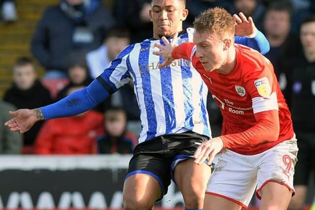Barnsley's Cauley Woodrow will be key if the Tykes can escape relegation. Picture: Steve Ellis