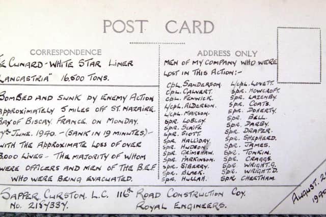 A hand-written postcard with 30 names from men from the Harrogate area who died on the Lancastria