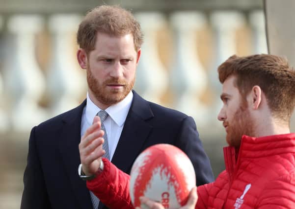 The Duke of Sussex talks with Leeds Rhino player, James Simpson, in the Buckingham Palace gardens, London, as he hosts the Rugby League World Cup 2021 draws. PA Photo. Picture date: Thursday January 16, 2020. See PA story ROYAL Sussex Rugby. Photo credit should read: Yui Mok/PA Wire