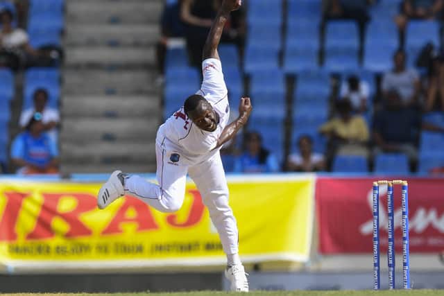 West Indies' Kemar Roach, pictured bowling during the Test series against India last year. Picture: Randy Brooks/AFP via Getty Images)