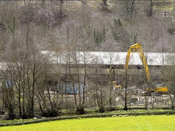 Work taking place last December to clear the former Hepworth site, where the new housing development is planned. Picture: Steve Ellis