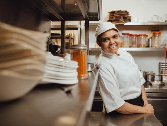 Minal in the kitchen at Prashad, whose dishes are now available as takeaways.