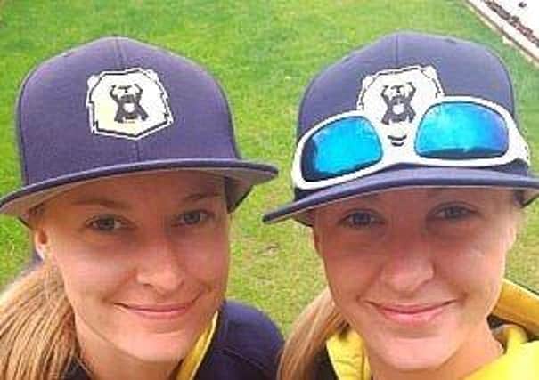 Wright stuff: Doctors by day, baseball players at the weekend; identical twins Kirstie Wright, left, and Kelly Wright.